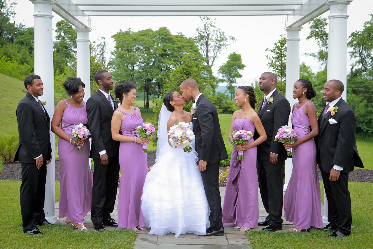 bride and groom kiss