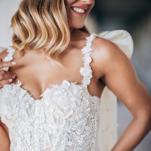 close up of lace details on wedding gown